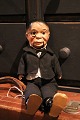 Old 
ventriloquist 
doll with 
papier mache 
head, body in 
straw and 
fabric clothes. 
The doll can 
...