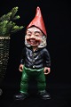 Antique painted 
terracotta 
Santa Claus 
with fine 
patina. 
Height: 31 cm.