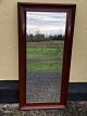 Older faceted mirror in a dark lacquered wooden frame. A little patina on glass and frame. ...