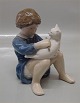 Royal 
Copenhagen 4631 
RC Girl with 
cat John 
Calster 15 cm 
2nd. In mint 
and nice 
condition