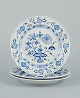 Meissen, 
Germany. A set 
of three Blue 
Onion Pattern 
dinner plates 
in porcelain. 
...