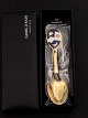 A Michelsen 
Christmas spoon 
2004 Sterling 
silver Design 
Anne Tholstrup 
in original 
unopened ...