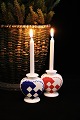 Royal 
Copenhagen 
earthenware 
Christmas heart 
in blue and red 
for small 
candle. H: 7.5 
cm. ...