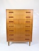 This chest of drawers of Danish design, created around the 1960s, is a beautiful example of the ...