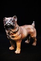 19th century painted terracotta figure of a pug dog with glass eyes and fine patina. H: ...