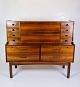 This rosewood chatol, designed by a Danish furniture architect around the 1960s, is a splendid ...