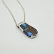 Large silver 
pendant with 
opal in blue 
and brown. 
Including long 
silver chain.
L. chain 70 
...