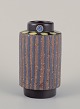 Mari Simmulson 
(1911-2000) for 
Upsala Ekeby. A 
ceramic vase 
with blue lines 
and yellow ...