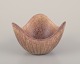 Gunnar Nylund 
for Rörstrand. 
Small ceramic 
bowl with 
ribbed design.
Eggshell glaze 
in earthy ...