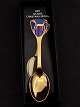 A. 
Michelsen/Georg 
Jensen 
Christmas spoon 
2007 Englelyde. 
Designed by Per 
Arnoldi gilded 
...