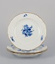 Meissen, 
Germany. Three 
hand-painted 
porcelain 
plates with 
blue flowers 
and insects, 
gold ...