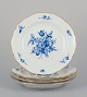 Meissen, 
Germany. A set 
of four antique 
porcelain 
plates 
hand-painted 
with blue 
flowers and ...