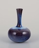 Gunnar Nylund 
(1904-1997) for 
Rörstrand, 
Sweden.
Miniature vase 
with a slender 
neck. Glaze in 
...