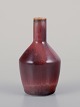 Carl Harry 
Stålhane 
(1920-1990) for 
Rörstrand. 
Miniature 
keramikvase 
with brown 
glaze.
Mid-20th ...