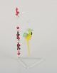 Murano, Italy. 
Rare sculpture 
of a parrot 
hanging on a 
stand.
Mouth-blown 
art ...