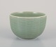 Axel Salto 
(1889-1961) for 
Royal 
Copenhagen. 
Ceramic bowl 
with ribbed 
decoration. 
Celadon ...