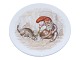 Royal 
Copenhagen  
Christmas, 
small tray with 
gnome and cat.
Factory first.
Diameter 10.6 
...