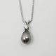 Necklace of 14k white gold, with a pendant of a large Tahitian cultured pearl, as well as a ...