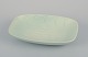 Rörstrand, 
Sweden. Large 
ceramic bowl in 
a modernist 
design. Rare 
model. Glaze in 
light green ...