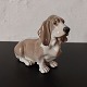 Figure of 
basset hound in 
porcelain from 
Royal 
Copenhagen. 
Designed by 
Jeanne Grut. 
Appears in ...