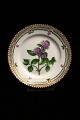 Royal 
Copenhagen 
Flora Danica 
side plate. 
Dia: 14.5cm. 
Decoration 
number: 
20/3552. 
1.sort. ...