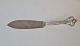 Cake knife in 
silver and 
steel from 1942 

Stamped the 
three towers 
Length 25.5 
cm.