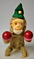 Mechanical 
monkey playing 
the maraca, 
20th century 
Germany. With 
hat. H. 17 cm. 
In the ear 
label ...