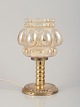 Helena Tynell, 
Finnish glass 
artist, for 
Limburg.
Designer table 
lamp in clear 
glass and ...