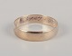 Danish 
goldsmith. 14 
karat gold 
alliance ring.
Marked.
Inscription 
dating back to 
...