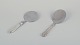 Danish 
silversmiths. 
Two serving 
spades in 830 
silver and 
stainless 
steel.
1940s.
Marked.
In ...