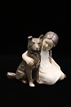 Rare porcelain figure from Bing & Grondahl of a girl with a dog. 
B&G#1973...