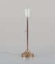 Nybro 
Armaturfabrik, 
Sweden. Brass 
table lamp.
Sleek 
Scandinavian 
design with 
wooden toggle 
...