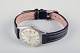 Omega Geneve 
ladies' 
wristwatch with 
a black leather 
strap.
1970s.
In good 
condition with 
...