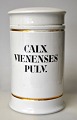 Apothecary jar 
in porcelain. 
19th century 
White porcelain 
with two gilt 
edges. Black 
text "CALX ...