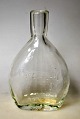 Holmegård 
pocket lark, 
clear glass, 
anniversary 
bottle 1967. 
Denmark. With 
the text: 1842 
- ...