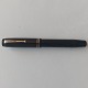 Black Parker 
Duofold 
fountain pen 
from the 1940s. 
Appears in good 
condition with 
no damage or 
...