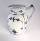Royal 
Copenhagen. 
Mussel painted, 
fluted. Milk 
jug. Model 159. 
Height 13,5 cm. 
Produced before 
...