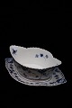 Royal 
Copenhagen Blue 
Fluted full 
lace sauce dish 
on fixed 
saucer. 
Decoration 
number: 1/1105. 
...