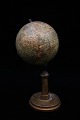 Decorative Danish mini globe in papier mache from around the year 1900 with a 
really fine patina. 
H: 23cm...