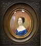 French 
miniature 
painting of a 
woman, 19th 
century. 
Unsigned. Oval. 
Paint on bone. 
In a French ...