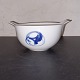 Small bowl in 
white porcelain 
with blue 
decoration on 
one side. 
Designed by 
Henning Koppel 
for ...
