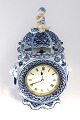 Royal 
Copenhagen. 
Blue Fluted, 
Full lace. 
Table clock 
with Zenith 
movement. Model 
1017. Height 
...