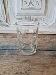 Vandglas 
dekoreret med 
måne og 
stjerner udført 
i presset glas
Højde 10 cm.