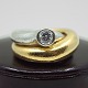 Ole Lynggaard; 
"Fidelity" ring 
of 18k gold and 
white gold, set 
with a 
brilliant-cut 
diamond, ...