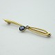 A. Dragsted 
gold jewellery
A. Dragsted; 
Brooch of 14k 
gold set with 
sapphire and 
diamond.
L. ...