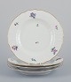 Royal 
Copenhagen 
Saxon Flower. 
Four dinner 
plates in 
porcelain. 
Hand-painted 
with polychrome 
...