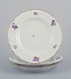 Royal 
Copenhagen 
Saxon Flower. 
Three dinner 
plates in 
porcelain. 
Hand-painted 
with polychrome 
...