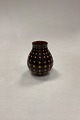 Royal 
Copenhagen 
Unique 
Stoneware Vase 
by Nils 
Thorsson. Brown 
with black and 
yellow dots. 
...