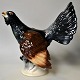 Earthenware 
figure of a 
capercaillie, 
c. 1900. 
Polychrome hand 
painted. 
Signed. With 
production ...