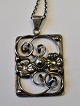 Silver pendant with chain, C. Brumberg Hansen (1937 - 1950), Copenhagen, Denmark. Decorated with ...